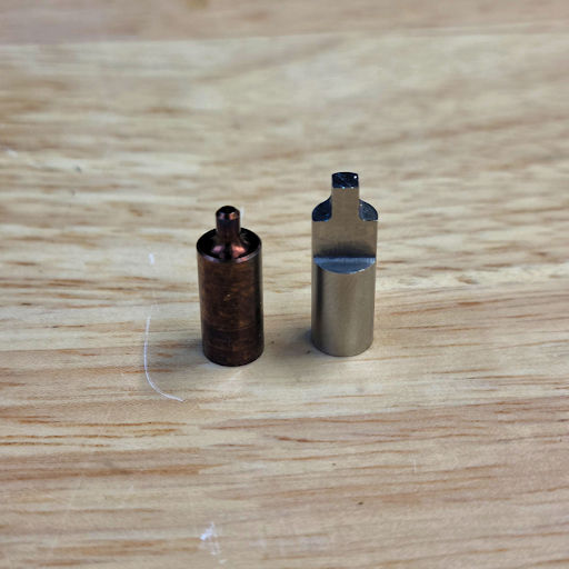 Example of the difference in profile between an AR-15 (left, Fortis Manufacturing)
                    and an HK 416 buffer retaining pin (right)